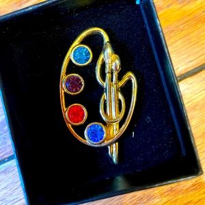 Vintage Avon artist pallets brooch with green, purple, red and blue sea glass.
